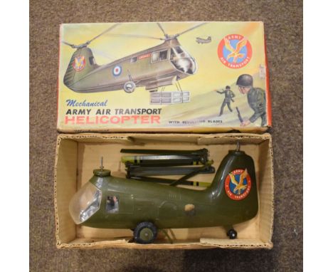 Marx Toys made mechanical army air transport helicopter with revolving blades, within original box  