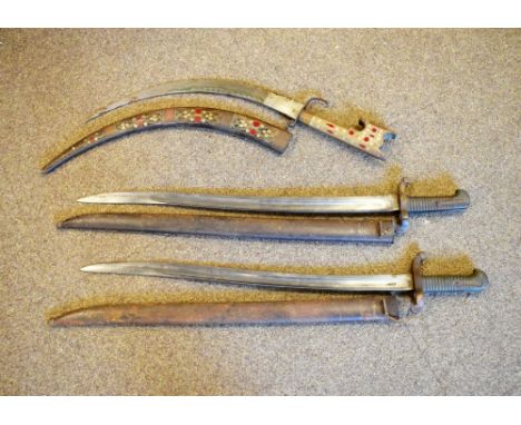 Two 19th Century rifle bayonets, both within scabbards, both measuring approx 71cm long, together with an Indian decorative s