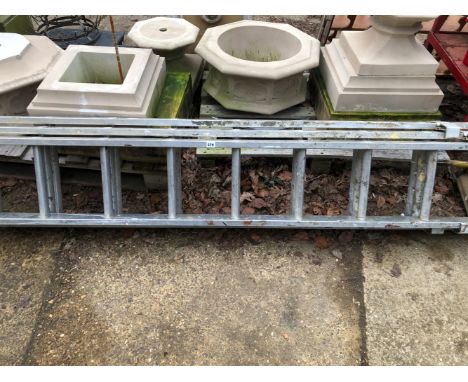 A ALUMINUM THREE SECTION LADDER. 