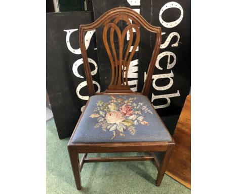 A CHIPPENDALE STYLE DINING CHAIR WITH EMBROIDERED SEAT