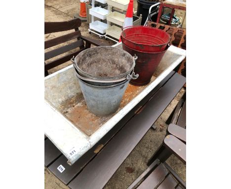 A GALVANIZED TROUGH AND FIVE BUCKETS.