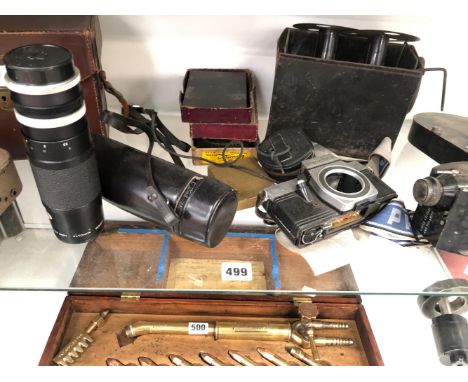 A VINTEN 16MM CAMERA WITH A 200FT MAGAZINE, A BELL &amp; HOWELL CINE CAMERA, A PRACTICA CAMERA AND LENSES