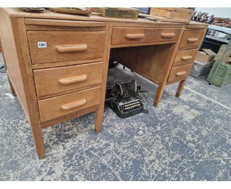 A PALE OAK PEDESTAL DESK 78 x 152 x 83 cm