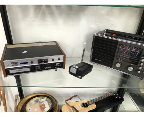A SINCLAIR MICROVISION TV, AN AKAI CR-800 CARTRIDGE RECORDER AND A SANYO 6-BAND RP 8550 RADIO