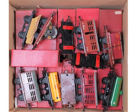 A large box of 11 Hornby postwar wagons including BR flat with container, BR cattle, 2x lumber, BR flat with cable drum, rota