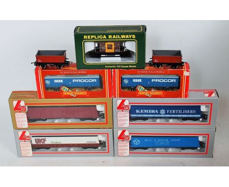 20 goods wagons by Hornby, Lima and Replica, including 4 Lima pallet vans, 2 Hornby Procar curtain sided vans, 8 Hornby MSV m
