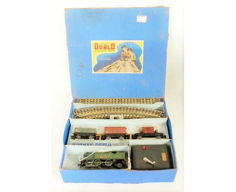A Hornby Dublo post war EDG7 tank goods train set containing LNER  green 0-6-2 tank engine, 3NE wagons, track oval and contro