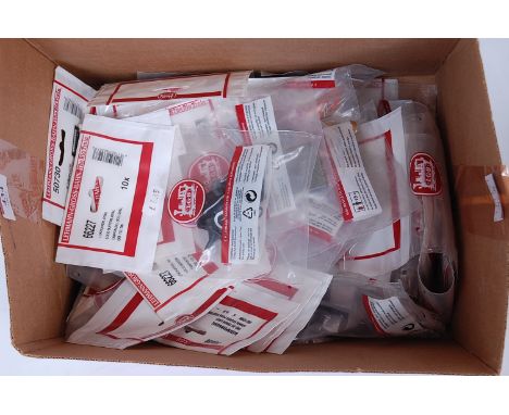 A small tray of assorted LGB GI accessories including plug-in bulbs, connection box, end of track light etc (all M-pkts M)