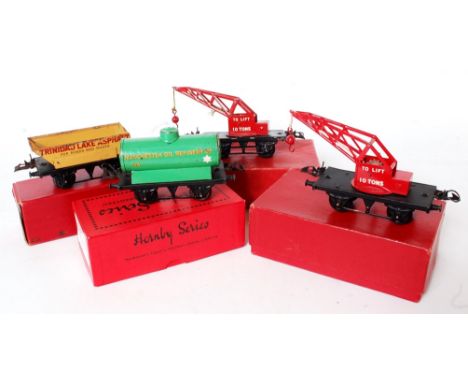 A small tray containing 7 postwar Hornby  wagons including No.1 Manchester Oil, SR  milk traffic, Esso tanker, No. 1 side tip