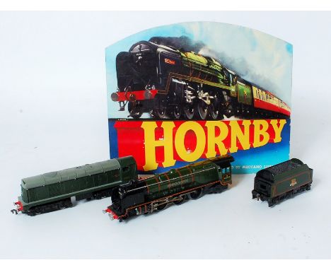 A small tray containing Hornby Dublo EDL12 gloss green 'Duchess of Montrose' loco - some playwear (G-BG) with a matching tend