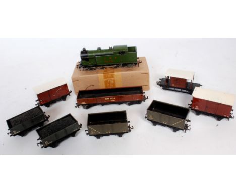 A post-war Hornby Dublo LNER green 0-6-2 tank engine (F-G) together with 8 NE wagons including brick and fish (G)