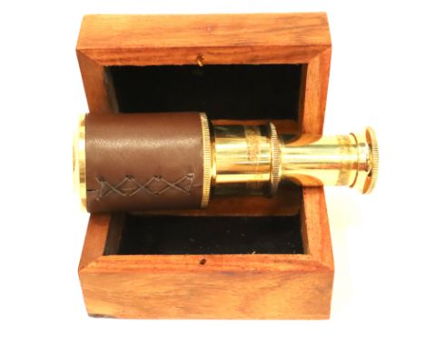 Boxed brass and leather three draw telescope. P&amp;P Group 1 (£14+VAT for the first lot and £1+VAT for subsequent lots) 