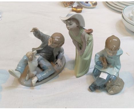 Two Nao figures, boy with dog &amp; boy with rabbit; a Lladro figure, girl in hat 