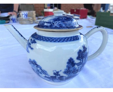 An 18th century Chinese Qianlong period blue &amp; white teapot with detailed decoration of country scenes, children riding a