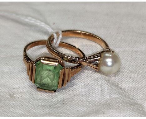 A dress ring set cushion cut green stone (worn), stamped '9ct', size M; a 9 carat hallmarked gold pearl set ring, 4.7 gm, siz