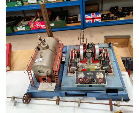 A large Wilesco electric driven steam engine with transmission gear; etc., on original metal base with integral control box (