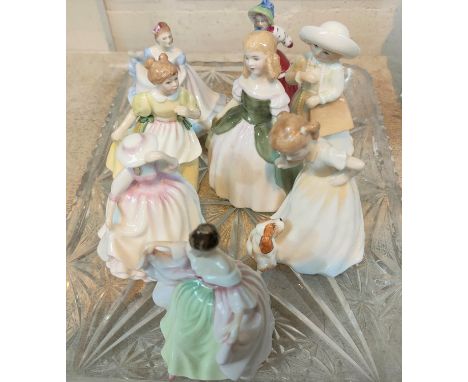 Eight small Royal Doulton figures; "Ninette", "Christmas Morn", "Sara", "Young Melody"m "Sit", "Almost Grown", "Penny" and "B
