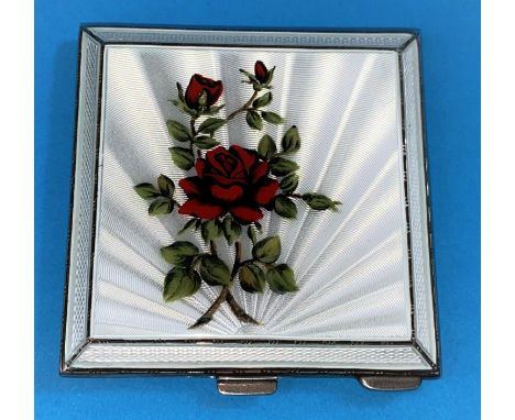 An engine turned hallmarked silver compact with enamel red rose on a white ground Birmingham 1960 3.5oz 