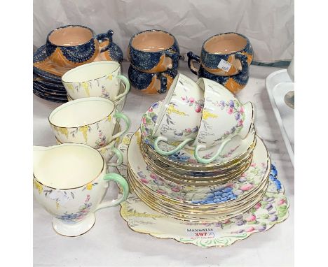 A 1930's floral tea set by Foley, 19 pieces; a Quimper part tea set, 11 pieces; etc. 