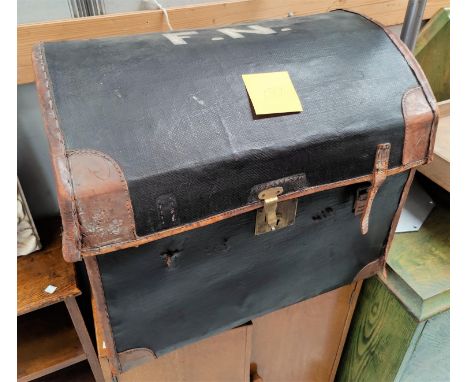 A vintage traveller's dome top trunk 