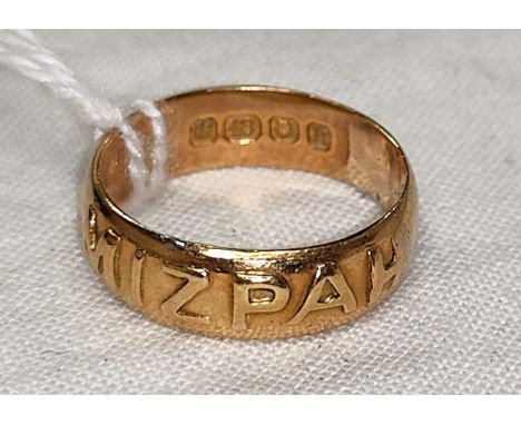 An 18 carat hallmarked gold 'Mizpah' ring, 4.1 gm, size K The ring has been resized or repaired, causing the letter H to be s