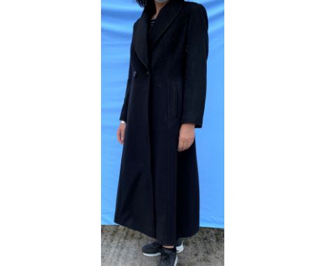 A Jaques Vert long black coat, wool with 7% cashmere, size 14, with original labels; a Michael Kors camel poncho with patch p