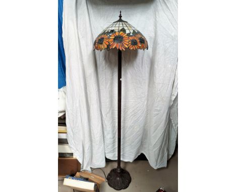 A modern Tiffany style standard lamp with coloured glass Art Nouveau style shade 