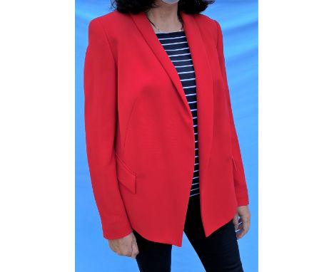 An ESCADA red jacket (M); a Lauren (Ralph Lauren) white cotton mix weave balzer (L) 