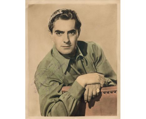 Tyrone Power signed 10x8 inch vintage colour photo. Good condition. All autographs come with a Certificate of Authenticity. W