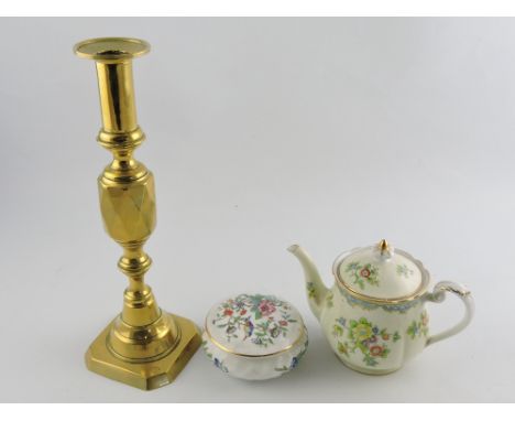 A 20th century Noritake teapot, floral decoration on a cream ground, H. 7cm; together with an Aynsley pot and cover, a brass 