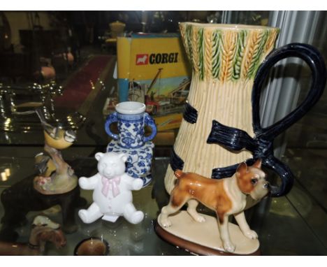 A Royal Worcester group of Blue Tits on a stump, H. 13cm, together with a jug and three other decorative items, (5)