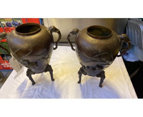  Sale Item:    2 METAL ELEPHANT HANDLED POTS (AF)  Vat Status:   No Vat   Buyers Premium:  This lot is subject to a Buyers Pr
