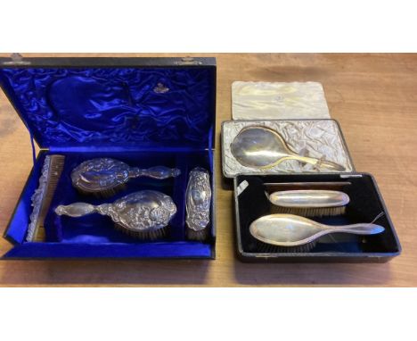  Sale Item:    2 SILVER DRESSING TABLE SETS- 1 MIRROR MISSING (AF)  Vat Status:   No Vat   Buyers Premium:  This lot is subje