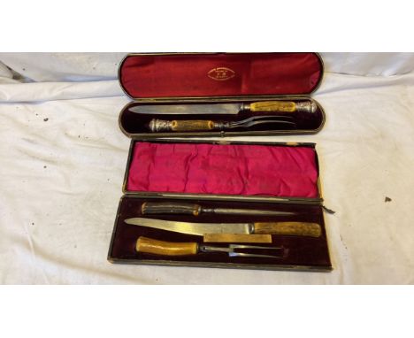  Sale Item:    2 CARVING SETS- ONE WITH SILVER TOPS  Vat Status:   No Vat   Buyers Premium:  This lot is subject to a Buyers 