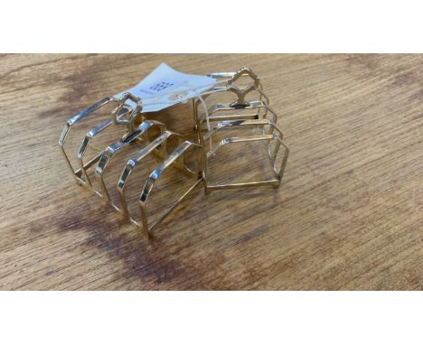  Sale Item:    2 SILVER TOAST RACKS   Vat Status:   No Vat   Buyers Premium:  This lot is subject to a Buyers Premium of 15% 