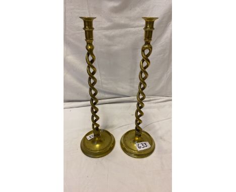  Sale Item:    2 LARGE BRASS CANDLESTICKS APPROX 52 CMS TALL  Vat Status:   No Vat   Buyers Premium:  This lot is subject to 