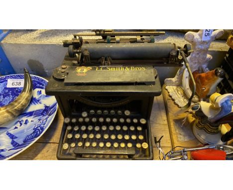  Sale Item:    L C SMITH &amp; BROS TYPEWRITER (AF)   Vat Status:   No Vat   Buyers Premium:  This lot is subject to a Buyers