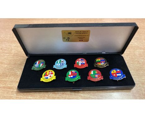 Sale Item:    LTD EDT 2010 W C FINALS SOUTH AFRICA BADGE SET  79 OF 200  Vat Status:   No Vat   Buyers Premium:  This lot is