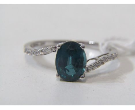KYANITE RING, 9ct white gold ring set an oval blue kyanite, approx 9mm spread with white zircons to shoulders, size R, double