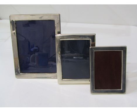 SILVER PHOTOFRAMES, 3 silver easel photoframes, the largest 21cm tall, the smallest 14cm height. Various makers and hallmarks