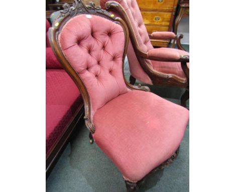 VICTORIAN CARVED WALNUT SPOONBACK LADY'S CHAIR, pink button back upholstery, carved seat crest and castors