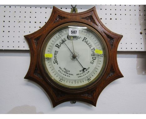 ANTIQUE ANEROID BAROMETER, carved octagonal oak surround, max diameter 40cm