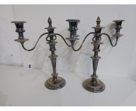 SILVER PLATE, pair of twin branch circular based candelabra, 38cm height