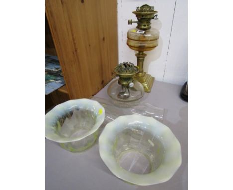 ANTIQUE OIL LAMPS, brass square based column support oil lamp and 1 other, with 2 green vaseline glass shades Lot 496: Metal 