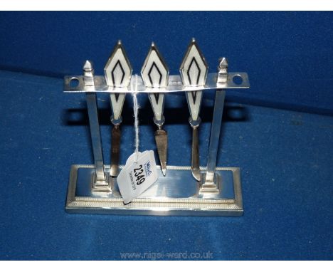 A stunning Art Deco silver and enamelled Manicure set with silver architectural rectangular stand, 5" long. The three nail to