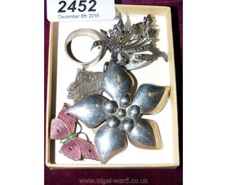 A large hallmarked silver brooch, silver and enamel butterfly, silver ring and other silver items.