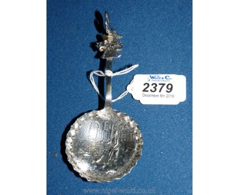 An antique Dutch tea caddy spoon, very ornate, marked J.G.P 925 Sterling silver, date I.