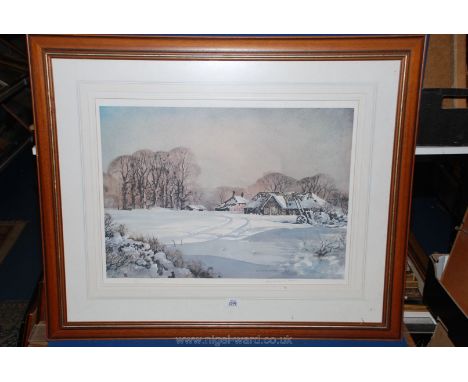 A very large limited edition Lithograph, 195/480 of a Kentish scene in winter 'The First Snow' by the U.S artist Rowland Hild