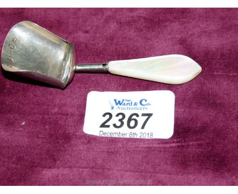 A silver caddy spoon with mother of pearl handle, Birmingham 1814.