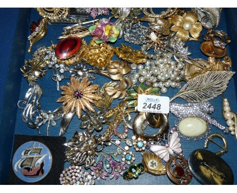 A good quantity of costume Brooches including a Christian Dior.